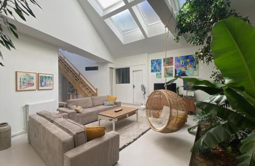 La Fayette-Eble House | Atelier Audusson - Espace atypique aux jardins intérieurs