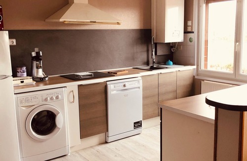 Gare Apartment | Comfortable 2-bedroom gîtes with private garage, close to all amenities and beach.