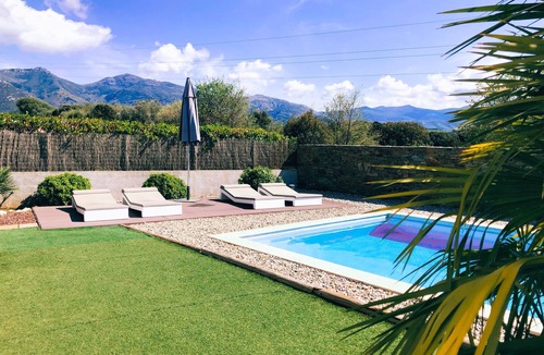 Oletta House | Contemporary villa with swimming pool and private garden