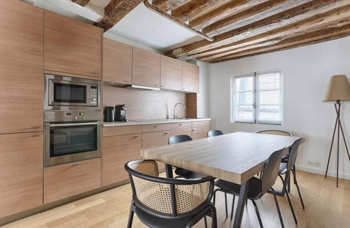 Saint-Germain-des-Pres Apartment | PARISIAN ELEGANCEWITH EXPOSED BEAMS PERFECTLY LOCATED-SAINT GERMAIN– RUE DU BUCI