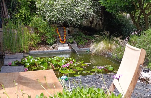 Quimper Apartment | The Charming Mahradja Suite and Its Japanese-Style Pond—A Timeless Escape