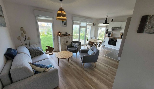 Charming modern apartment with garden and private parking